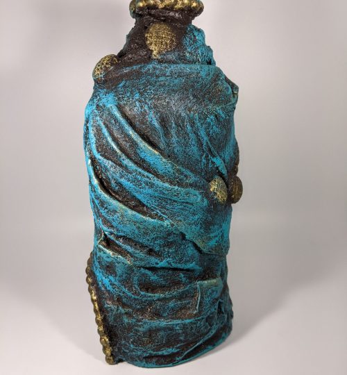 Elegant turquoise wrapped oval shaped bottle