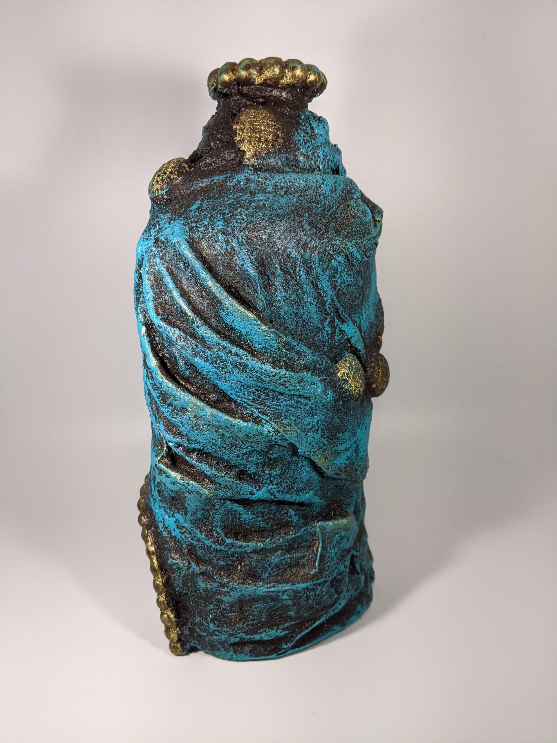 Elegant turquoise wrapped oval shaped bottle